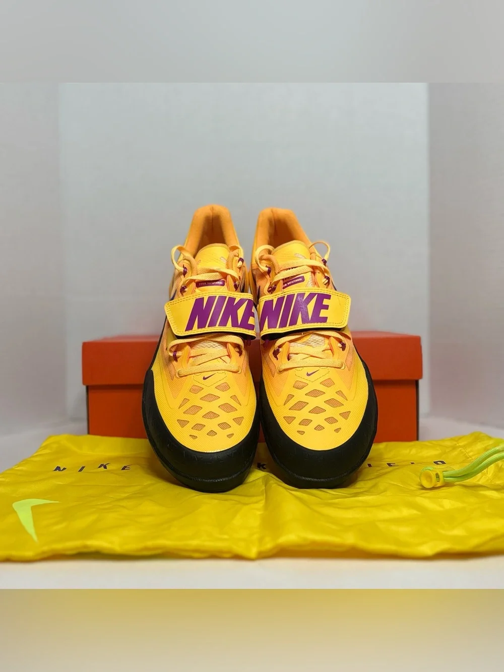 Nike Men’s Athletic Shoes - Yellow with Blue Swoosh Track & Field Throwing shoes